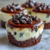 Indulge in irresistible mini cheesecake bites with Oreo crust, perfectly baked and chilled.
