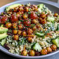 Lemon Vinaigrette Grain Bowls with Roasted Chickpeas featuring fluffy quinoa, crispy chickpeas, and fresh vegetables drizzled with tangy lemon dressing.